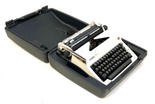 An Olympia typewriter in plastic carry case