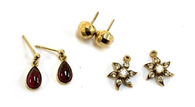 A pair of gold mounted garnet drop earrings, the garnets 0.9cmL; together with a pair of 9ct gold