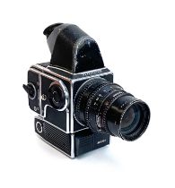 A Hasselblad 500ELX camera, with a Hasselblad Carl Zeiss Sonnar 150mm f4 lens, no. 6109458