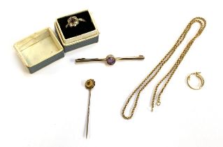 A 9ct and amethyst bar brooch (pin missing), 1.4g; a 9ct gold and silver paste ring, 1.7g; a