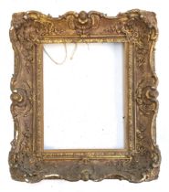 A 19th century gilt gesso Rococo style frame with shell cresting, overall 59x51cm rebate