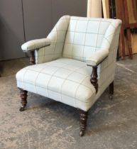 A 19th century armchair, with turned underarm supports, ceramic casters marked 'C&C Patent', 69cmW