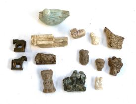 A small lot of interesting archeological and later artefacts, to include a ram, oxen, embracing