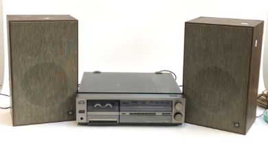 A Sony JJ-700B turntable; together with a pair of Spells Audio speakers