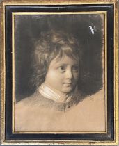 A 19th century charcoal portrait of a young boy, 39x30cm