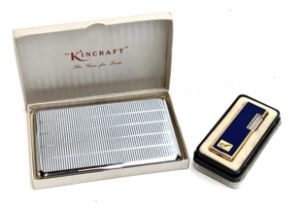 A Ronson 'Pipe' lighter, in original box; together with a Kincraft cigarette case, in original box