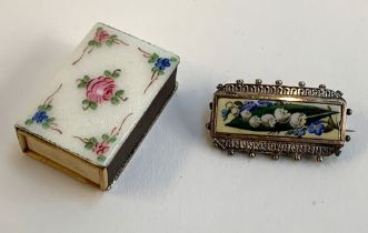 A Victorian Aesthetic movement silver brooch with enamel plaque painted with snowdrops and forget me