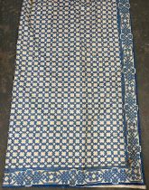 A long pair of lined chintz curtains, blue interlocking pattern, 240cm wide ungathered, 336cm drop