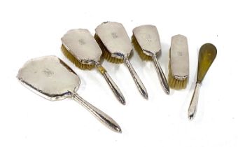 An early 20th century Japanese silver dressing table set, marked Okubo Sterling 998, comprising