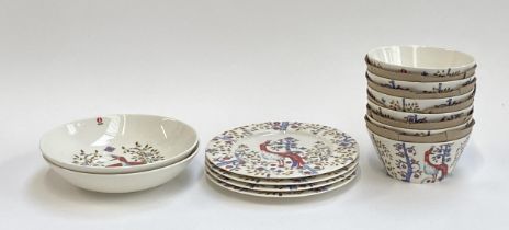 A quantity of iitala 'Taika' white ceramics, 0.6l bowls (6), 22cm plates (4), 22cm deep plate (2)