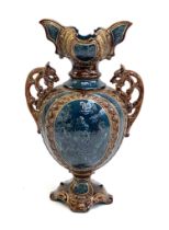 A Grove & Stark majolica brown and blue glazed twin handled vase, c.1880, 34.5cmH