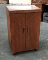A Singer sewing machine and table, 50x43x84cmH (when closed)