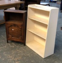 A small oak bookcase with hinged magazine rack, 46cmW; and a further white painted bookcase,