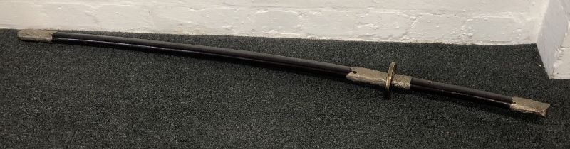 A reproduction Samurai sword with leather sheath, the blade 78cmL