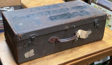 A vintage canvas covered suitcase, 75cmW
