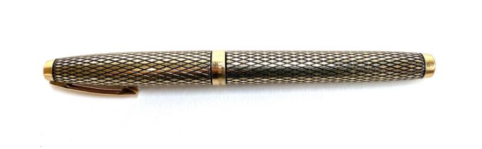 A Sheaffer Imperial Sovereign fountain pen with 14k gold filled diamond pattern case and 14k gold