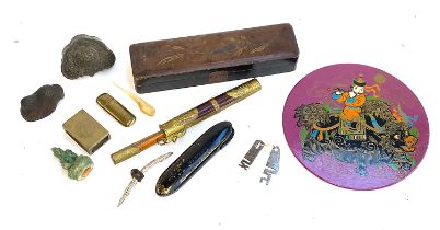 A mixed lot to include lacquered pen box, Mongolian circular wall plaque, Chinese matchbox case, etc