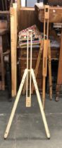 Two folding artists easels