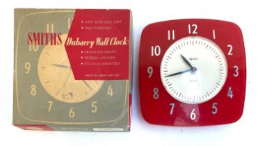 A Smiths Dubarry red electric wall clock, in original box