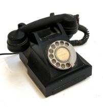 A vintage GPO black bakelite rotary dial telephone