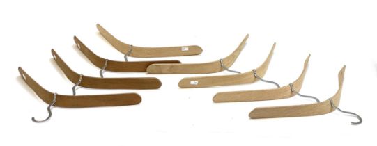 A set of eight Skagerak 'Pilot' coat hangers designed by Nina Tolstrup, stainless steel and
