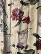 A pair of heavy barley coloured curtains featuring a design of various flowers, lined and interlined