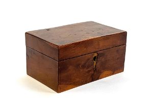 A yew wood tea caddy, lined in blue paper, 19cm wide