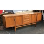 A G plan teak mid century sideboard, four drawers flanked by four doors, 214x46x80cmH