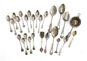 A set of six silver apostle terminal coffee spoons by Mappin & Webb; and five coffee spoons with