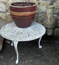 A large glazed planter; a low aluminium garden table; and an urn in a wrought metal stand (3)