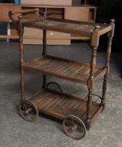 A good slatted oak three tier hostess trolley, on oversized casters, 82x42x101cmH