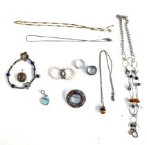 A mixed lot of jewellery to include a Victorian silver Montrose agate brooch (af, stones missing),