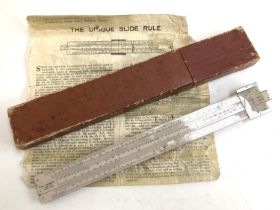 The 'Unique' log log slide rule, in original box with instructions