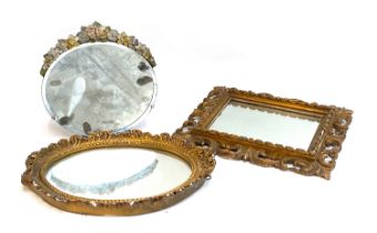Three mirrors: a rectangular pierced acanthus framed mirror 42x37cm, together with one with floral