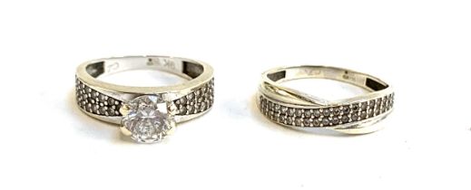 Two 9ct gold and cubic zirconia set rings, size K and L, gross weight 3.9