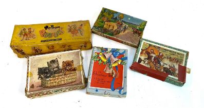 A small lot to include Pelham Puppet, boxed, Victory puzzles, Huntley & Palmers tin, etc