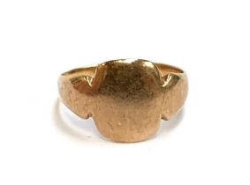 A 9ct gold child's signet ring, size F 1/2, 1.6g