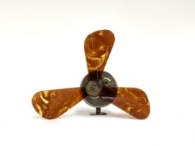 A La Brise celluloid compact pocket fan with faux tortoiseshell blades