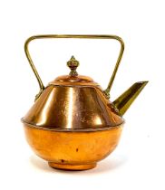 A 19th century brass and copper kettle in the manner of Christopher Dresser, bears Rd no. 151114