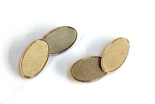 A pair of 9ct gold cufflinks with engine turned design, gross weight 6.3g