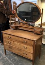 An Edwardian mahogany dressing table, oval adjustable mirror over three drawers, 107x50x78cmH
