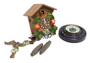 A cuckoo clock (af); together with a wall barometer