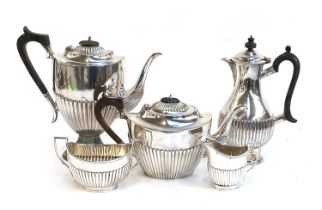 A five piece silver plated Walker & Hall tea service