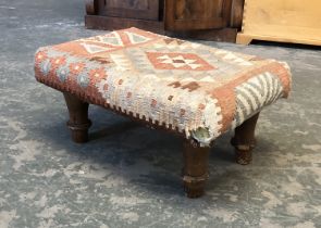 A small kilim upholstered footstool (legs af), 64x44x32cm
