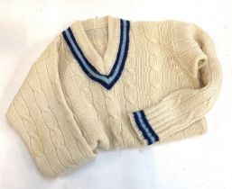 A vintage cable knit V neck cricket jumper