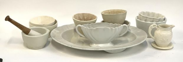 A mixed lot of white ceramics to include a Dartmouth Devon twin handled flower vase, mortar and