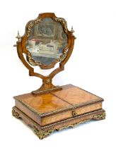 A late 19th century continental ormolu mounted quarter veneered dressing mirror, 46cmW 64cmH