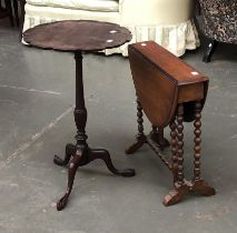 A mahogany wine table with shaped top; together with a bobbin turned small Sutherland table (2)