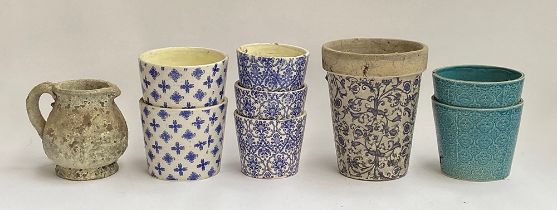 A lot of ceramic planters, the tallest 24cmH; together with a pottery jug and tall resin pot