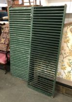 A pair of green painted shutters, each 58x167cm